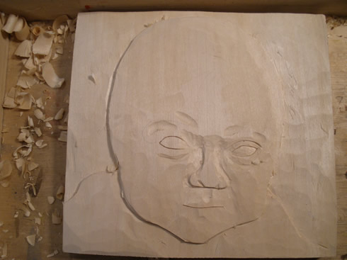 baby portrait wood carving